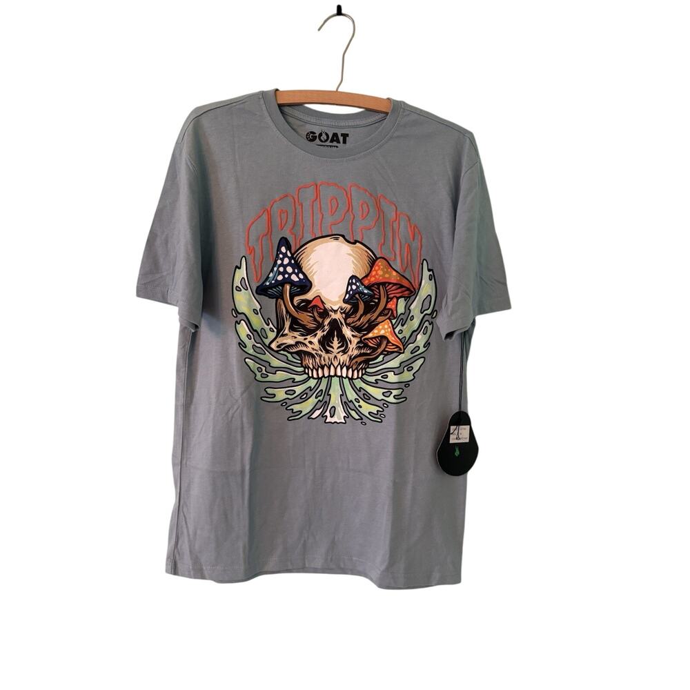 GOAT Medium “Trippin” Light Blue Graphic Tee. 19” PTP And 27” Length